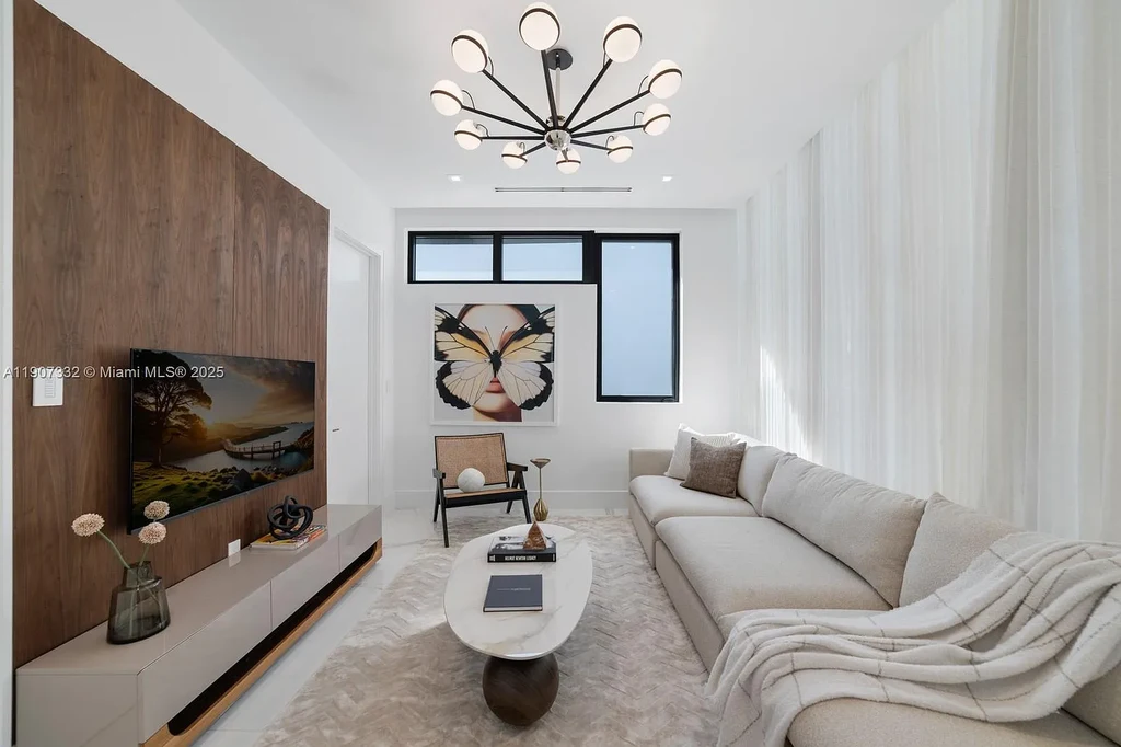 $40 Million Oceanfront Miami Beach Estate with Rooftop Terrace and Saltwater Pool 8 Oceanfront primary suite at 7845 Atlantic Way featuring private terrace, spa bath, and panoramic Atlantic views