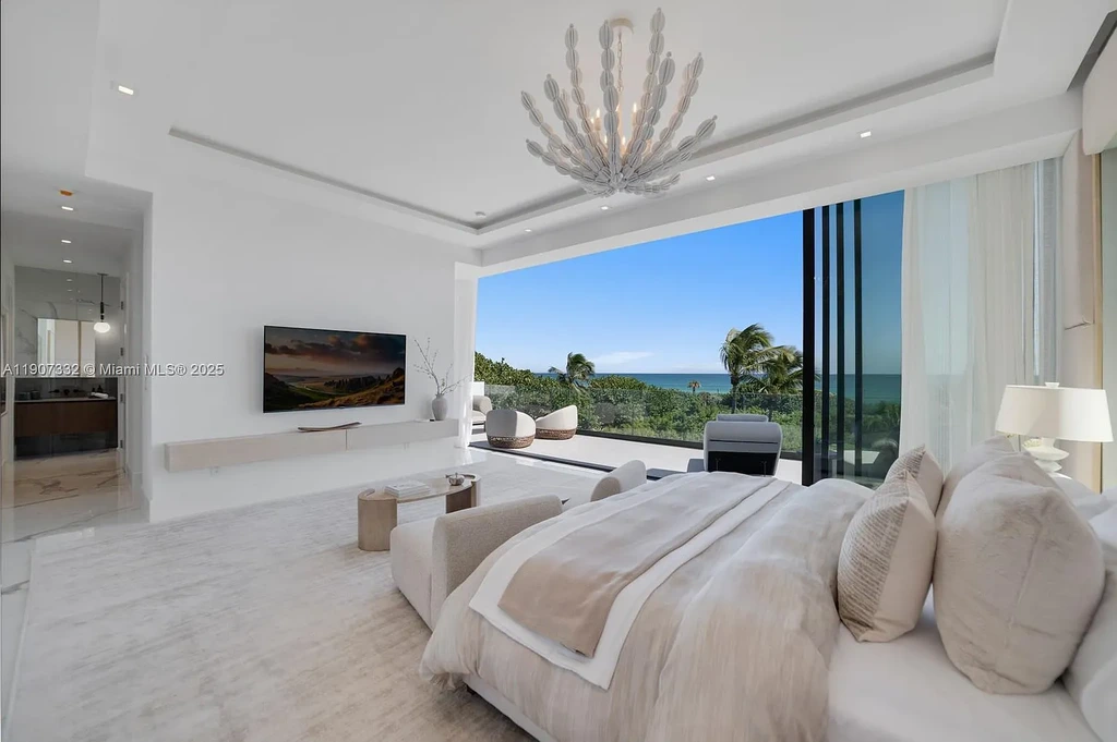 $40 Million Oceanfront Miami Beach Estate with Rooftop Terrace and Saltwater Pool 14 Oceanfront primary suite at 7845 Atlantic Way featuring private terrace, spa bath, and panoramic Atlantic views