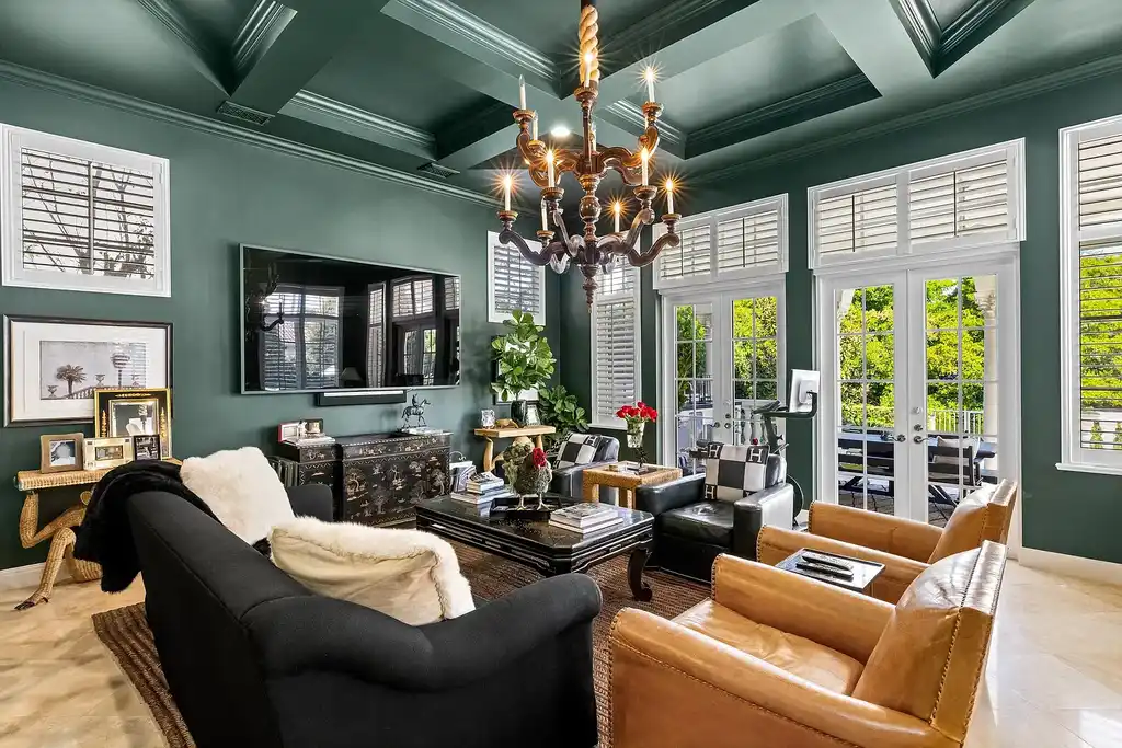 853 Harbour Isle Place luxury waterfront estate in North Palm Beach Florida featuring 5 bedrooms 7 bathrooms 7169 sq ft with private deep-water dock and resort-style pool