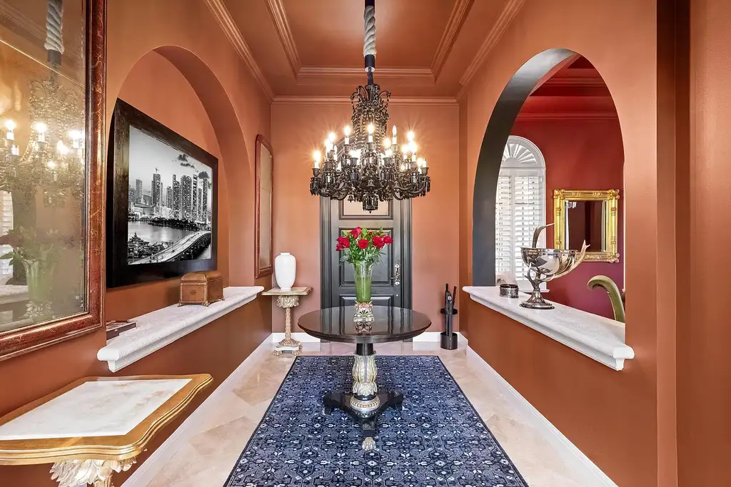 853 Harbour Isle Place luxury waterfront estate in North Palm Beach Florida featuring 5 bedrooms 7 bathrooms 7169 sq ft with private deep-water dock and resort-style pool