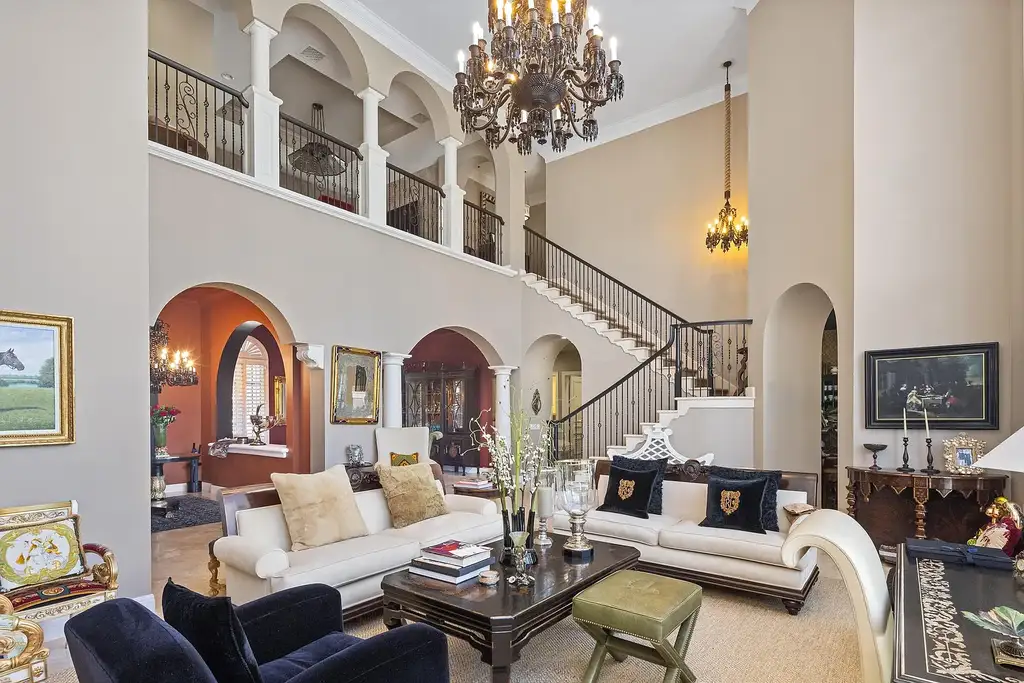 853 Harbour Isle Place luxury waterfront estate in North Palm Beach Florida featuring 5 bedrooms 7 bathrooms 7169 sq ft with private deep-water dock and resort-style pool