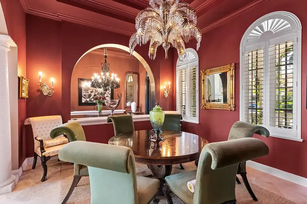 853 Harbour Isle Place luxury waterfront estate in North Palm Beach Florida featuring 5 bedrooms 7 bathrooms 7169 sq ft with private deep-water dock and resort-style pool