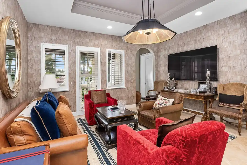 853 Harbour Isle Place luxury waterfront estate in North Palm Beach Florida featuring 5 bedrooms 7 bathrooms 7169 sq ft with private deep-water dock and resort-style pool