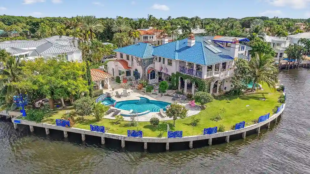 Exquisite $22.3 Million Waterfront Point-Lot Estate in Boca Raton Offers Grand Coastal Living 5 1201 Marble Way Boca Raton waterfront estate with French-inspired architecture, private pools, and expansive Intracoastal views.