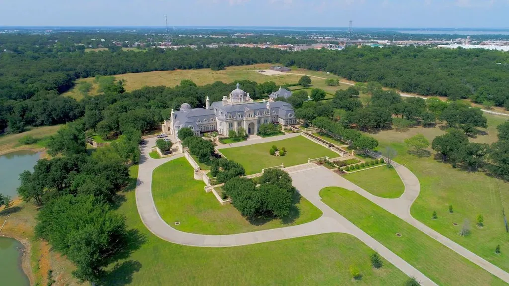 The 5 Largest Houses in Texas Ranked by Verified Square Footage (2025) 1 Aerial view of The Olana (Champ d’Or) at 1851 Turbeville Road, Hickory Creek, showing the 48,000 sq ft, French-style mansion, confirming it is the largest house in Texas.