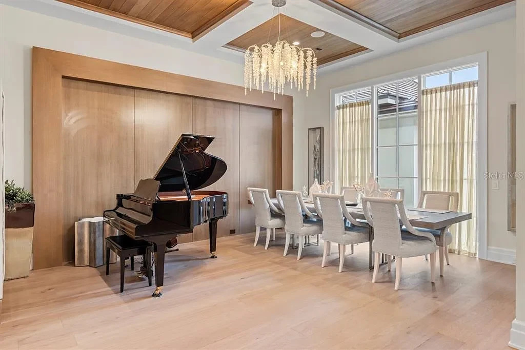 Stunning Ultra Luxury Estate Listed at $12.8 Million in Four Seasons Golden Oak Orlando 10 Interior view of 10273 Summer Meadow Way Orlando FL showing open-plan living area with high ceilings and natural light