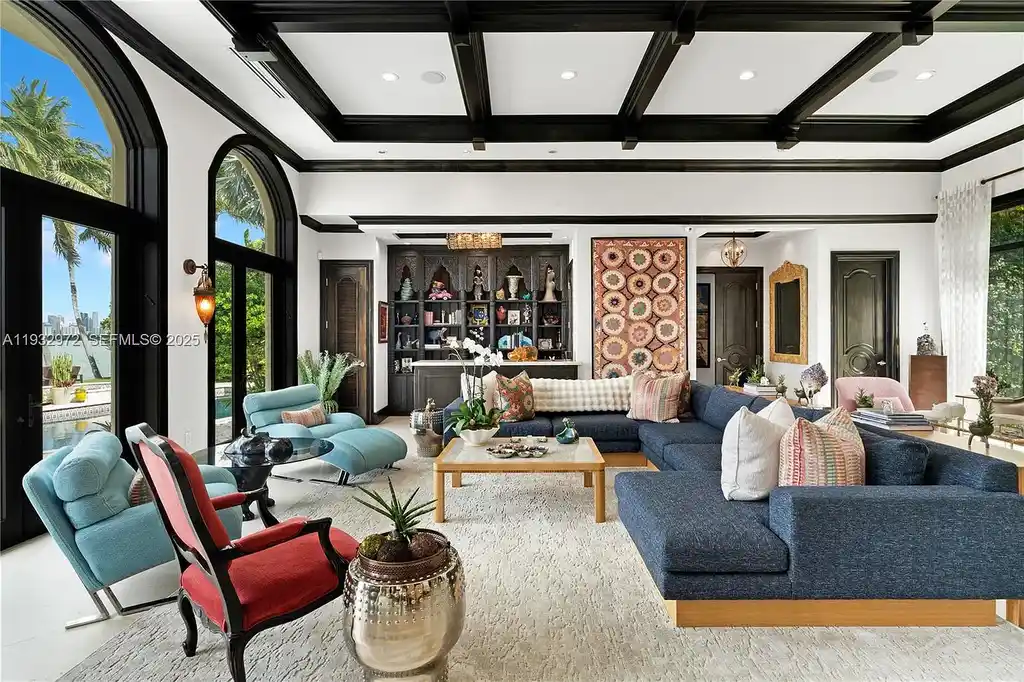 $34.5 Million Waterfront Estate Redefines Quiet Luxury in Bay Harbor Islands 7 Waterfront view of 10330 W Broadview Dr, a luxury home in Bay Harbor Islands for sale, featuring a Mediterranean-style design with open bay and Intracoastal views.