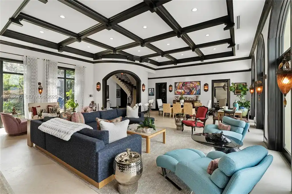 $34.5 Million Waterfront Estate Redefines Quiet Luxury in Bay Harbor Islands 6 Waterfront view of 10330 W Broadview Dr, a luxury home in Bay Harbor Islands for sale, featuring a Mediterranean-style design with open bay and Intracoastal views.