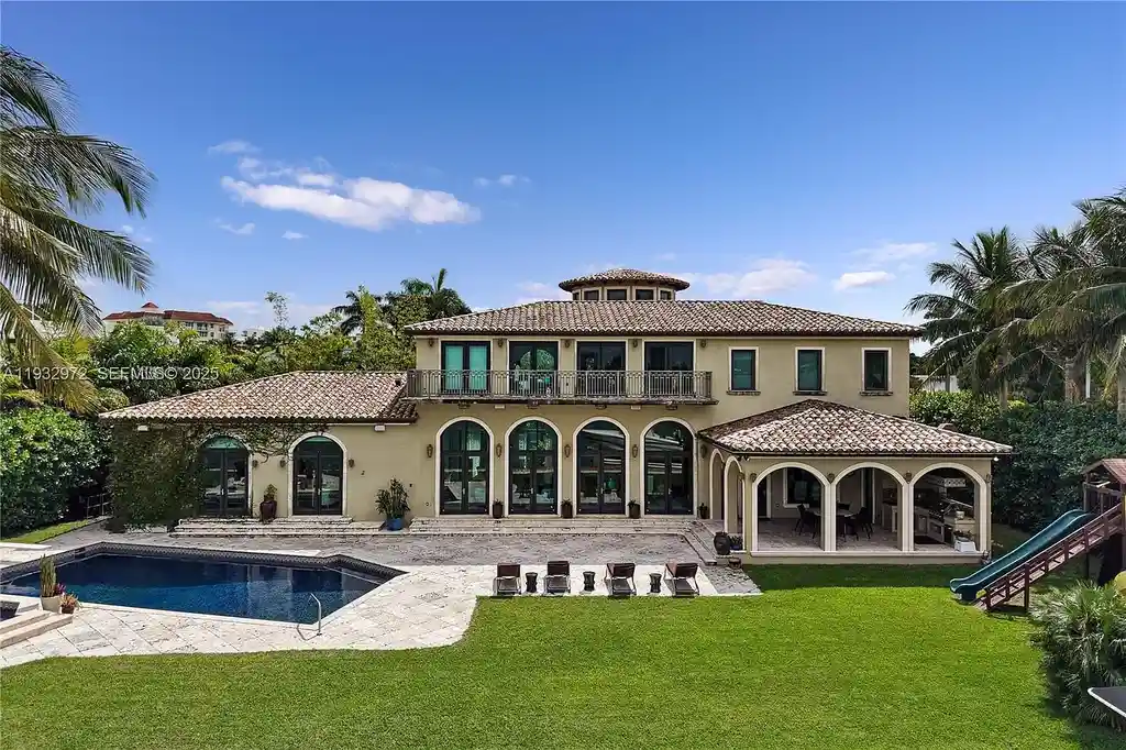$34.5 Million Waterfront Estate Redefines Quiet Luxury in Bay Harbor Islands 15 Waterfront view of 10330 W Broadview Dr, a luxury home in Bay Harbor Islands for sale, featuring a Mediterranean-style design with open bay and Intracoastal views.