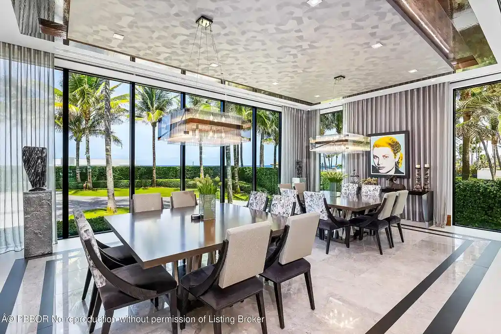 Aerial view of 1660 S Ocean Blvd showing 2.06-acre beachfront estate and private dock