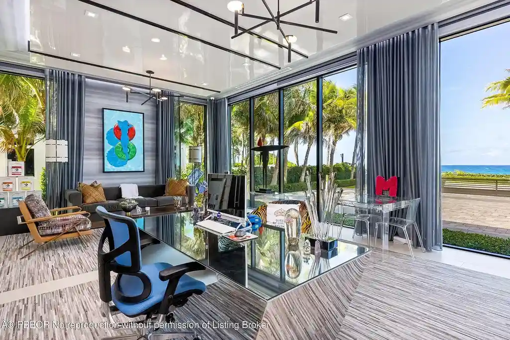 Aerial view of 1660 S Ocean Blvd showing 2.06-acre beachfront estate and private dock