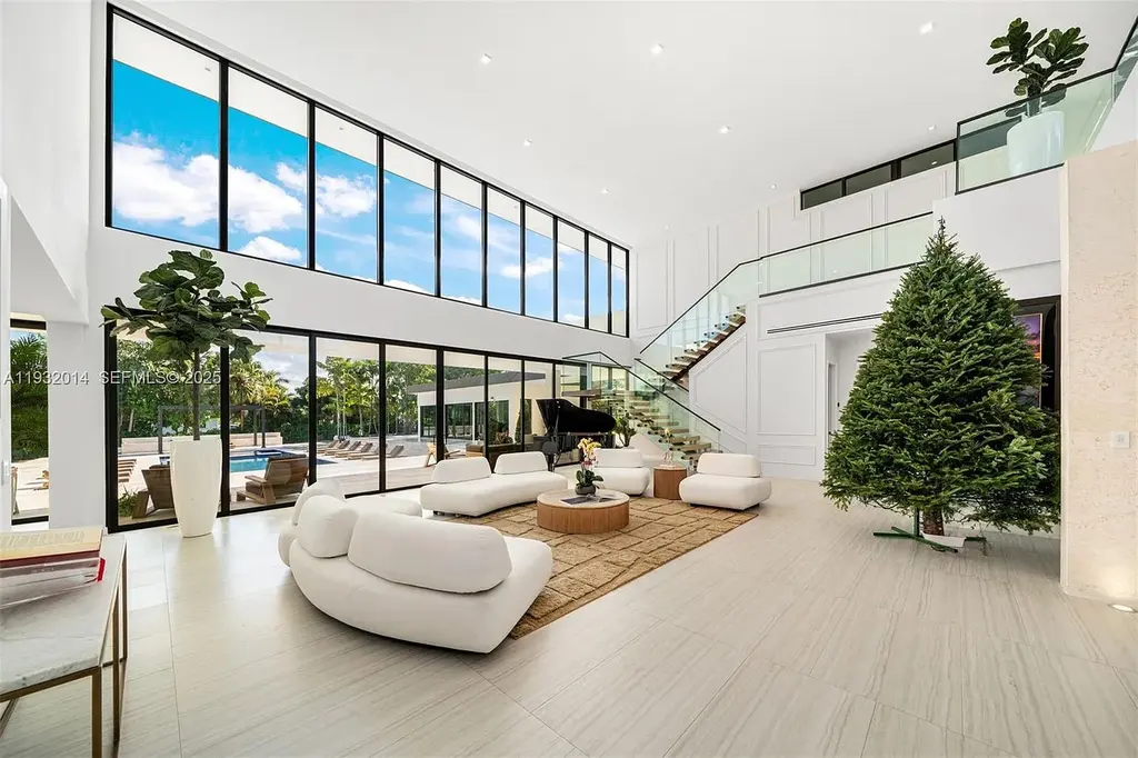 $14.9 Million Modern Estate on 3.36 Acres Redefines Private Luxury Living in Fort Lauderdale 7 Modern luxury estate at 17841 SW 70th Pl in Fort Lauderdale featuring a gated entrance and expansive 3.36-acre lot