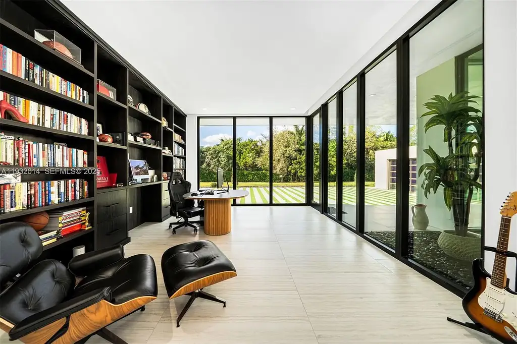 $14.9 Million Modern Estate on 3.36 Acres Redefines Private Luxury Living in Fort Lauderdale 11 Modern luxury estate at 17841 SW 70th Pl in Fort Lauderdale featuring a gated entrance and expansive 3.36-acre lot