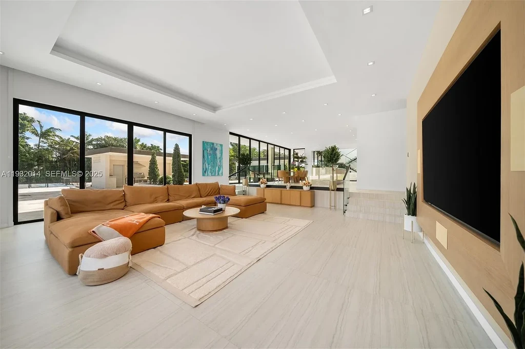 $14.9 Million Modern Estate on 3.36 Acres Redefines Private Luxury Living in Fort Lauderdale 12 Modern luxury estate at 17841 SW 70th Pl in Fort Lauderdale featuring a gated entrance and expansive 3.36-acre lot