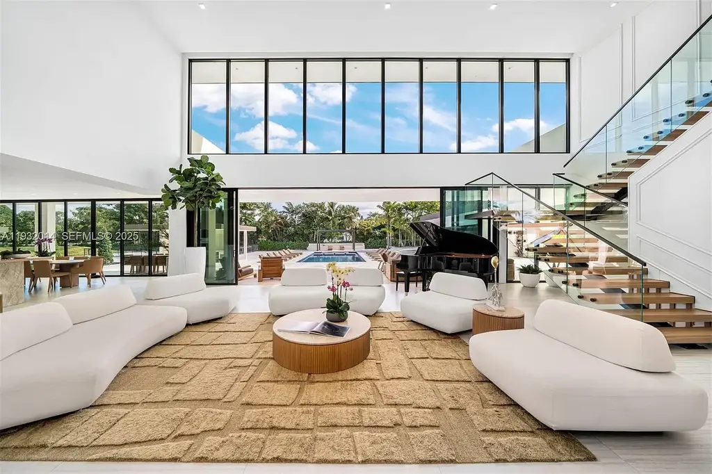 $14.9 Million Modern Estate on 3.36 Acres Redefines Private Luxury Living in Fort Lauderdale 6 Modern luxury estate at 17841 SW 70th Pl in Fort Lauderdale featuring a gated entrance and expansive 3.36-acre lot