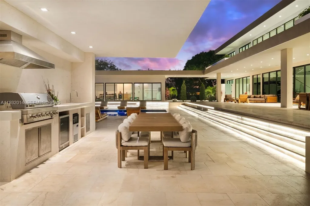 $14.9 Million Modern Estate on 3.36 Acres Redefines Private Luxury Living in Fort Lauderdale 15 Modern luxury estate at 17841 SW 70th Pl in Fort Lauderdale featuring a gated entrance and expansive 3.36-acre lot