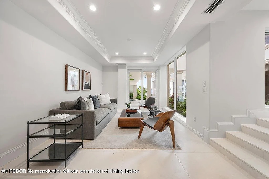 A Once in a Generation Ultra Rare Dual Waterfront Estate in Manalapan Offered at $44.9 Million 16 Aerial view of dual waterfront home in Manalapan with private dock and direct ocean access