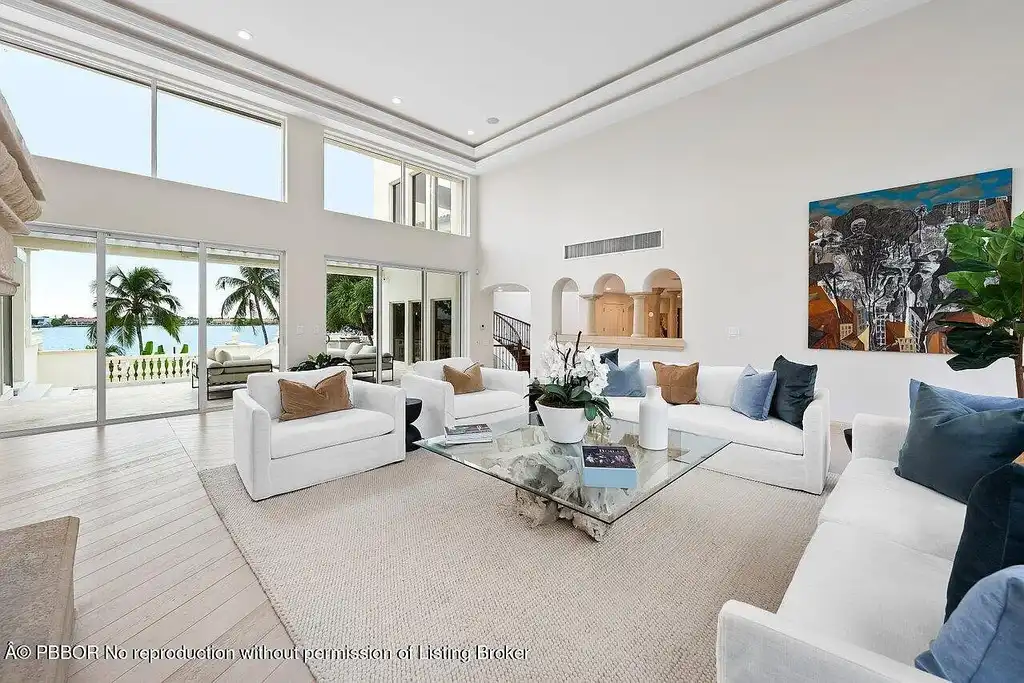 A Once in a Generation Ultra Rare Dual Waterfront Estate in Manalapan Offered at $44.9 Million 7 Aerial view of dual waterfront home in Manalapan with private dock and direct ocean access
