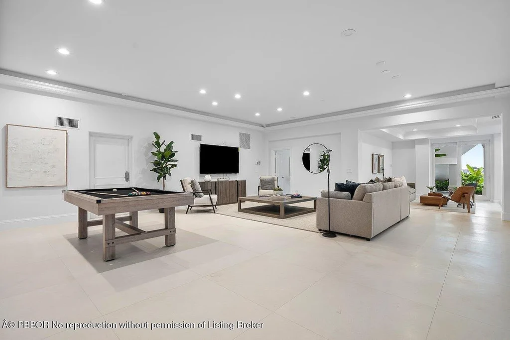 A Once in a Generation Ultra Rare Dual Waterfront Estate in Manalapan Offered at $44.9 Million 14 Aerial view of dual waterfront home in Manalapan with private dock and direct ocean access