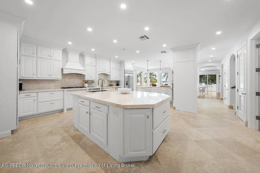 A Once in a Generation Ultra Rare Dual Waterfront Estate in Manalapan Offered at $44.9 Million 10 Aerial view of dual waterfront home in Manalapan with private dock and direct ocean access