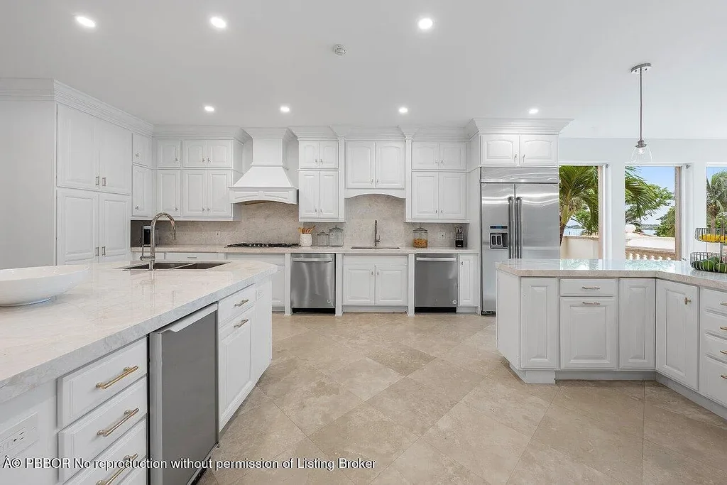 A Once in a Generation Ultra Rare Dual Waterfront Estate in Manalapan Offered at $44.9 Million 9 Aerial view of dual waterfront home in Manalapan with private dock and direct ocean access