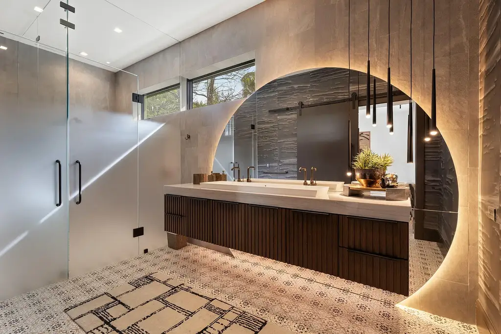 A $25.8 Million Contemporary Masterpiece Redefining Luxury Living Inside Jupiter’s Elite Bear’s Club 12 Luxury home for sale at 210 Bears Club Drive featuring modern design and landscaped grounds