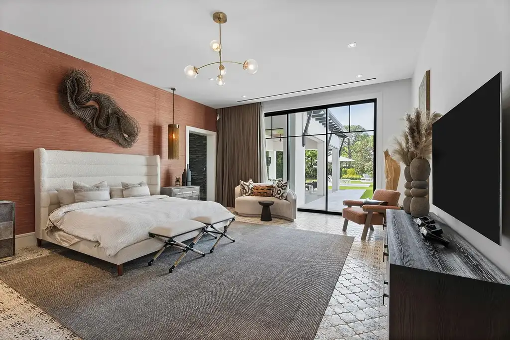 A $25.8 Million Contemporary Masterpiece Redefining Luxury Living Inside Jupiter’s Elite Bear’s Club 14 Luxury home for sale at 210 Bears Club Drive featuring modern design and landscaped grounds