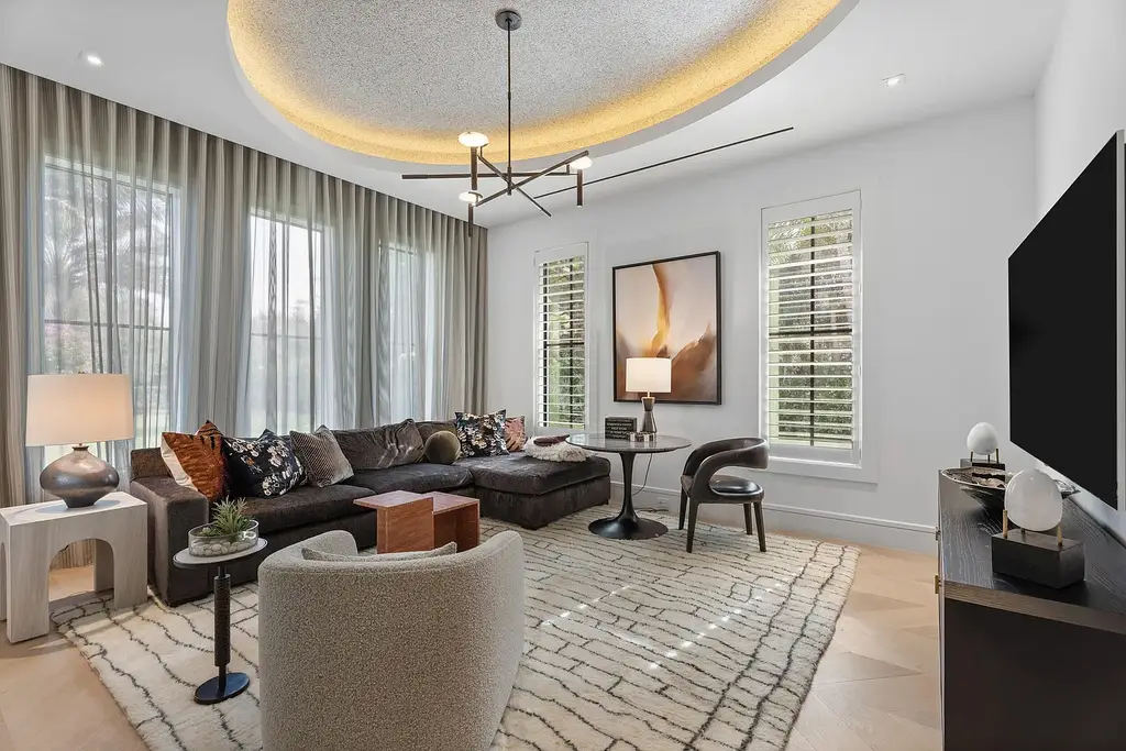 A $25.8 Million Contemporary Masterpiece Redefining Luxury Living Inside Jupiter’s Elite Bear’s Club 7 Luxury home for sale at 210 Bears Club Drive featuring modern design and landscaped grounds