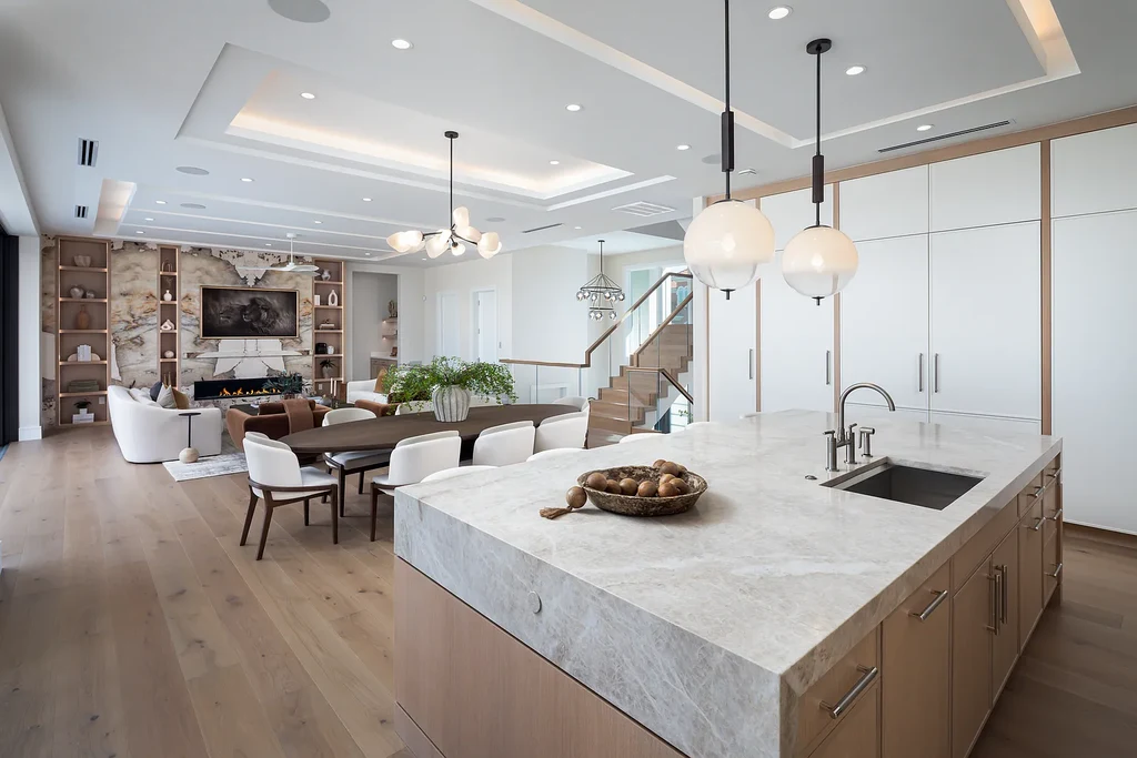 Interior and exterior views of 223 Bayview Avenue Naples FL showing 6-bedroom waterfront estate with modern coastal design, infinity pool, elevated terrace, and private dock.