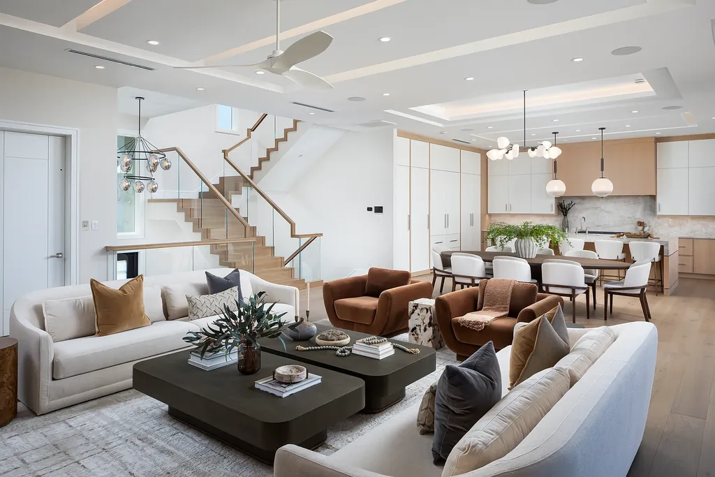 Interior and exterior views of 223 Bayview Avenue Naples FL showing 6-bedroom waterfront estate with modern coastal design, infinity pool, elevated terrace, and private dock.