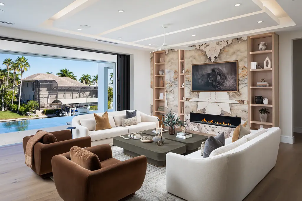 Interior and exterior views of 223 Bayview Avenue Naples FL showing 6-bedroom waterfront estate with modern coastal design, infinity pool, elevated terrace, and private dock.