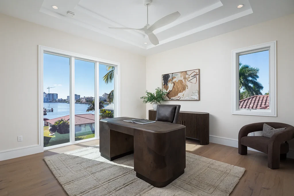 Interior and exterior views of 223 Bayview Avenue Naples FL showing 6-bedroom waterfront estate with modern coastal design, infinity pool, elevated terrace, and private dock.