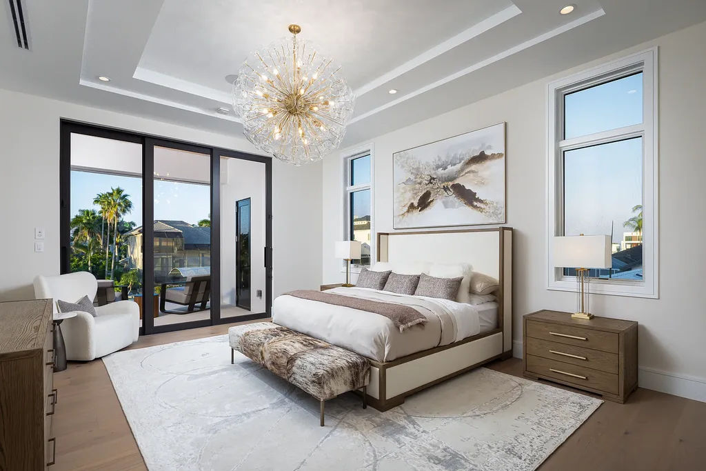 Interior and exterior views of 223 Bayview Avenue Naples FL showing 6-bedroom waterfront estate with modern coastal design, infinity pool, elevated terrace, and private dock.