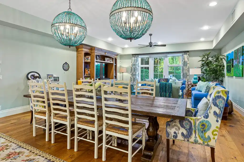 $13.5 Million Luxury Wellington Estate Featuring Private Tennis Court, Pool, and Equestrian Amenities 11 Outdoor pool and cabana at 2359 Muir Circle, Wellington, surrounded by manicured gardens and private tennis court