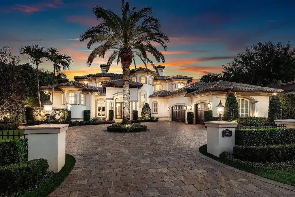$12.5 Million Boca Raton Waterfront Estate Featuring Resort-Style Pool, and Private Dock 5 Resort-style backyard of Boca Raton estate featuring heated swimming pool, spa, outdoor lounge, and panoramic canal views