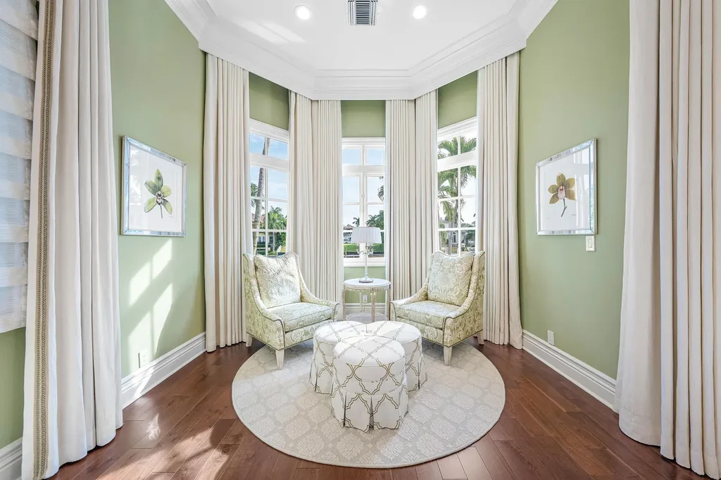 $12.5 Million Boca Raton Waterfront Estate Featuring Resort-Style Pool, and Private Dock 15 Resort-style backyard of Boca Raton estate featuring heated swimming pool, spa, outdoor lounge, and panoramic canal views