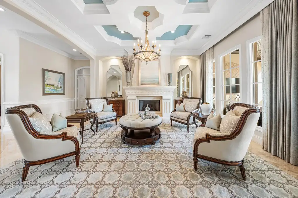 $12.5 Million Boca Raton Waterfront Estate Featuring Resort-Style Pool, and Private Dock 7 Resort-style backyard of Boca Raton estate featuring heated swimming pool, spa, outdoor lounge, and panoramic canal views