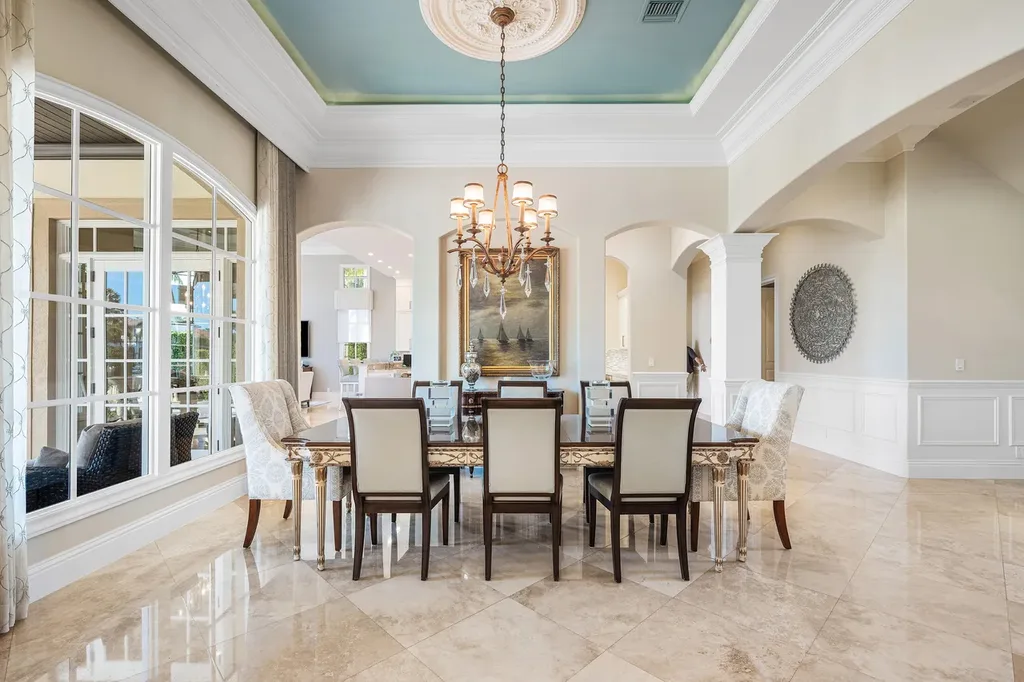 $12.5 Million Boca Raton Waterfront Estate Featuring Resort-Style Pool, and Private Dock 11 Resort-style backyard of Boca Raton estate featuring heated swimming pool, spa, outdoor lounge, and panoramic canal views