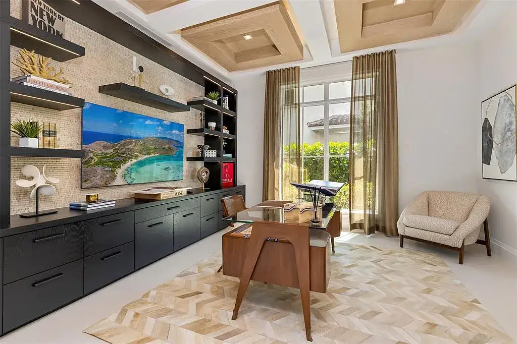 Ultra Luxury $28.4 Million Waterfront Estate Offering Exceptional Coastal Living in Fort Lauderdale 12 Luxurious waterfront exterior view of the modern estate at 2520 Del Lago Dr in Fort Lauderdale, showcasing the canal frontage, heated pool, and contemporary architectural design.