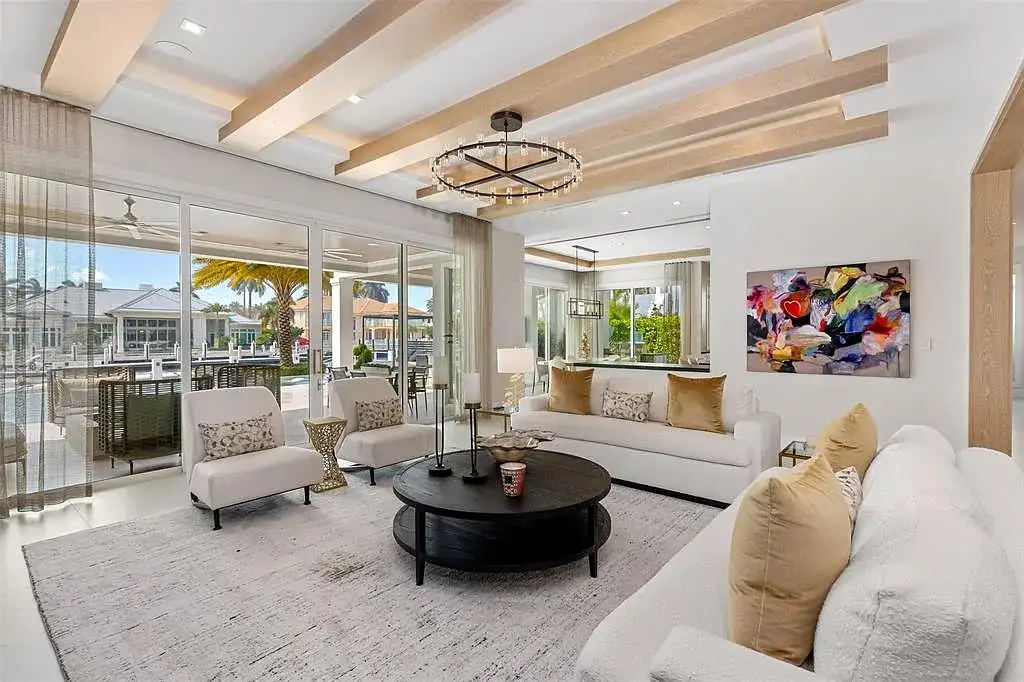 Ultra Luxury $28.4 Million Waterfront Estate Offering Exceptional Coastal Living in Fort Lauderdale 7 Luxurious waterfront exterior view of the modern estate at 2520 Del Lago Dr in Fort Lauderdale, showcasing the canal frontage, heated pool, and contemporary architectural design.