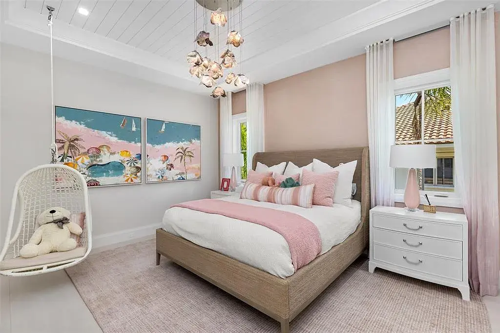 Ultra Luxury $28.4 Million Waterfront Estate Offering Exceptional Coastal Living in Fort Lauderdale 16 Luxurious waterfront exterior view of the modern estate at 2520 Del Lago Dr in Fort Lauderdale, showcasing the canal frontage, heated pool, and contemporary architectural design.