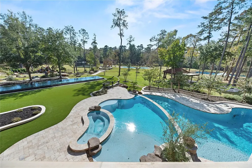 A Mediterranean Masterpiece Rising Above the Woodlands of Magnolia, Texas Seeks for $11,500,000 35 38262 Windy Ridge Trl Magnolia TX 77355 36