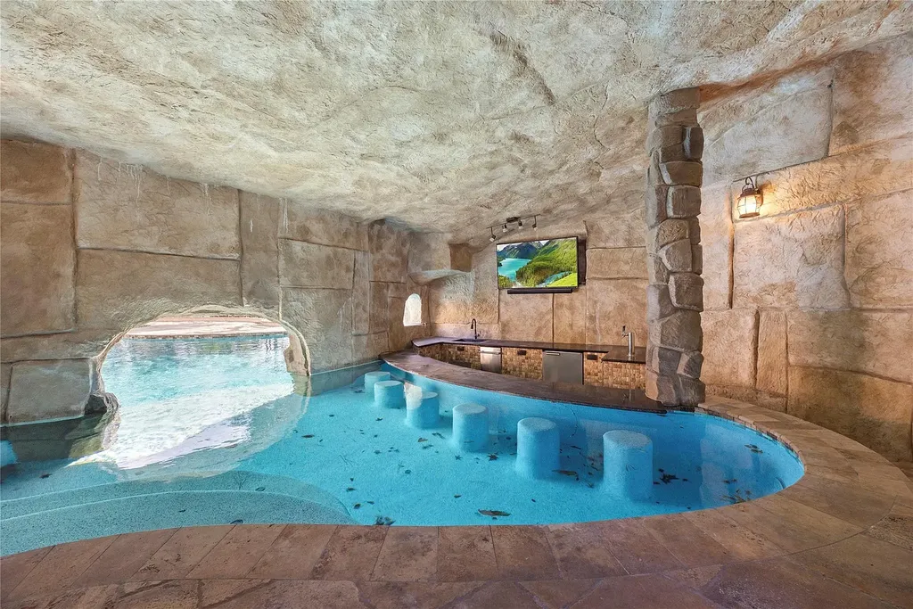 A Mediterranean Masterpiece Rising Above the Woodlands of Magnolia, Texas Seeks for $11,500,000 36 38262 Windy Ridge Trl Magnolia TX 77355 37