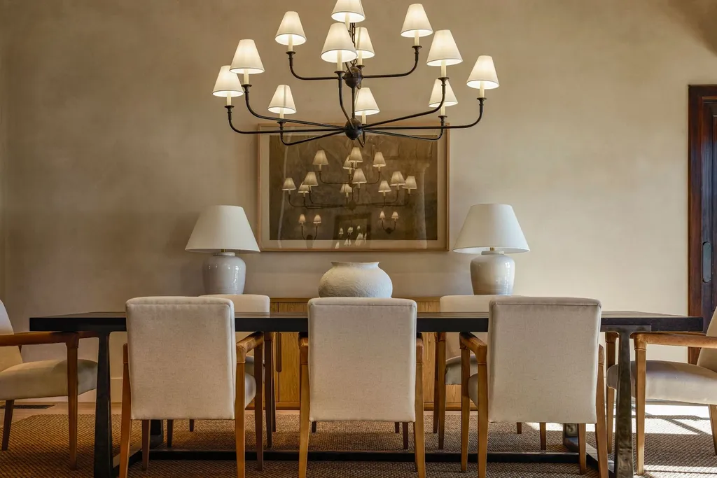 Oceanfront Masterwork Listed at 43 Million Presents One of Southern California’s Most Extraordinary Blufftop Estates 6 Elegant formal dining room at 4130 Calle Isabella featuring a minimalist chandelier, neutral upholstered chairs, and refined contemporary decor.
