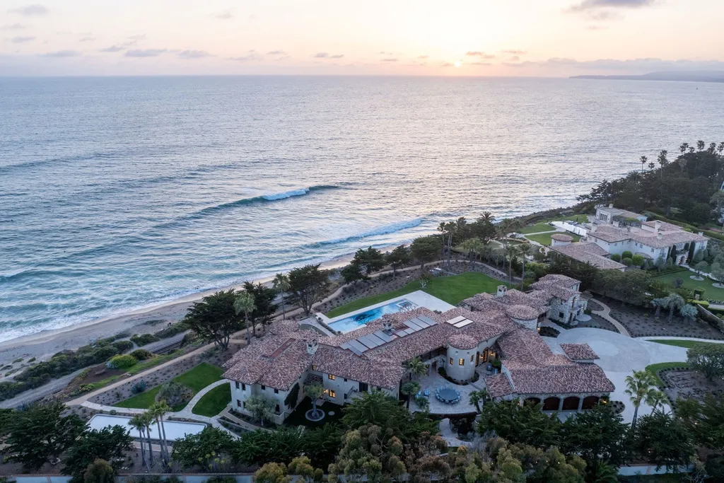 Oceanfront Masterwork Listed at 43 Million Presents One of Southern California’s Most Extraordinary Blufftop Estates 9 Aerial sunset view of the oceanfront estate at 4130 Calle Isabella in San Clemente, showcasing its Mediterranean architecture, expansive grounds, pool, and direct coastline setting.