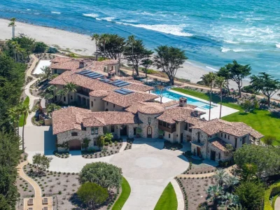 Aerial view of the oceanfront estate at 4130 Calle Isabella in San Clemente featuring a Mediterranean compound, blufftop setting, extensive landscaping, and direct coastal frontage.