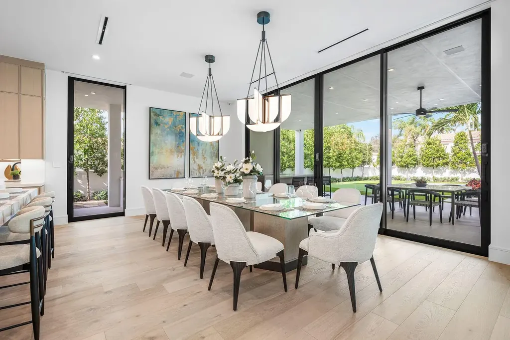 A $17.8 Million Contemporary Estate Redefines Luxury Living in Boca Raton 11 Contemporary exterior of 481 Thatch Palm Drive, a newly built luxury home in Royal Palm Yacht & Country Club, Boca Raton