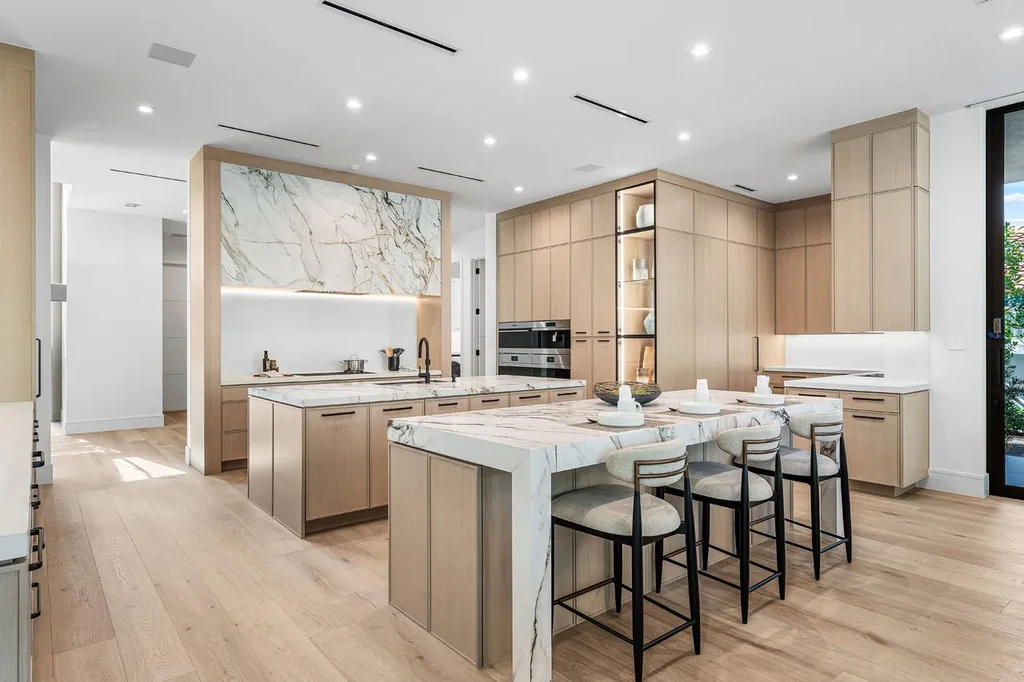 A $17.8 Million Contemporary Estate Redefines Luxury Living in Boca Raton 10 Contemporary exterior of 481 Thatch Palm Drive, a newly built luxury home in Royal Palm Yacht & Country Club, Boca Raton