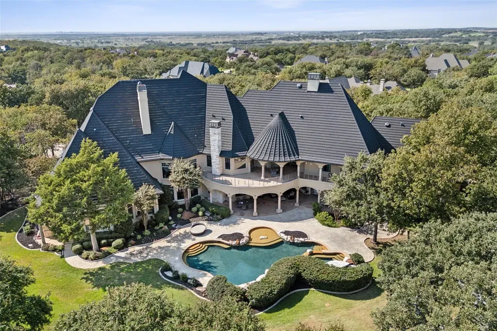 A $6.975 Million Steel Framed Estate Anchors Tour 18’s Most Enduring Address 10 5700-masters-ct-flower-mound-texas-aerial-backyard-pool