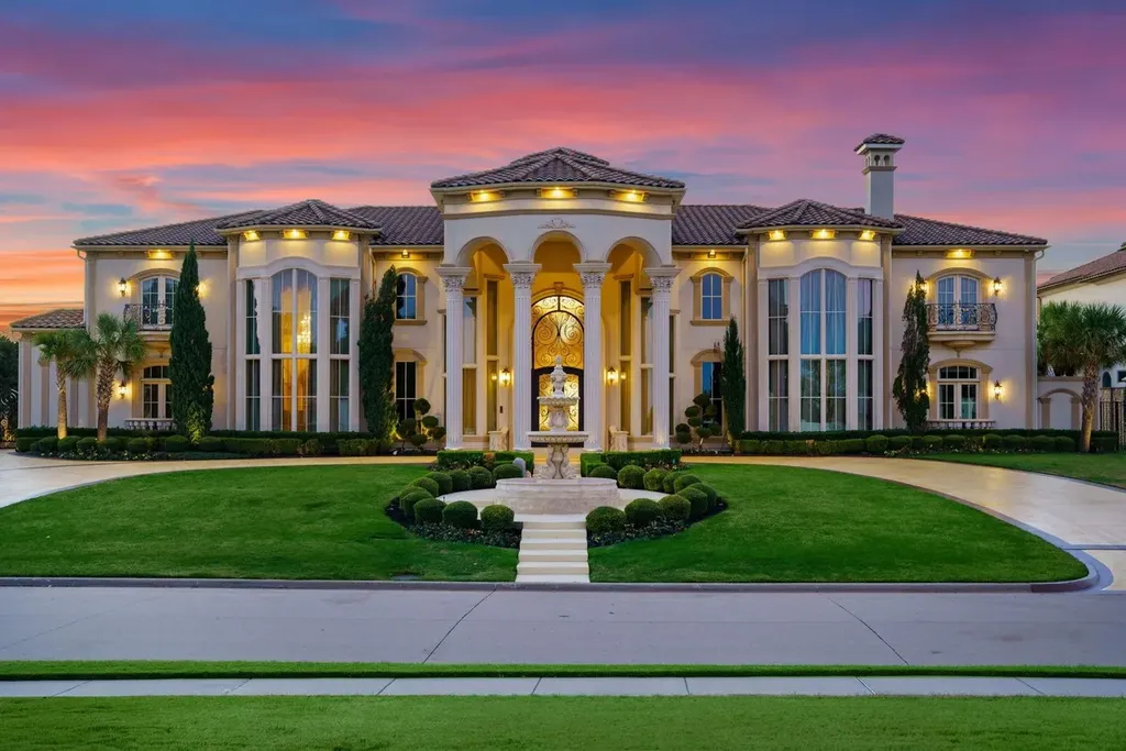 A Venetian Inspired Plano Estate Lists for 7.5 Million as a Rare Architectural Masterpiece in Kings Gate 1 Twilight exterior of the Venetian inspired estate at 6509 Sudbury Rd in Plano featuring grand columns sweeping symmetry manicured lawns and dramatic architectural lighting.